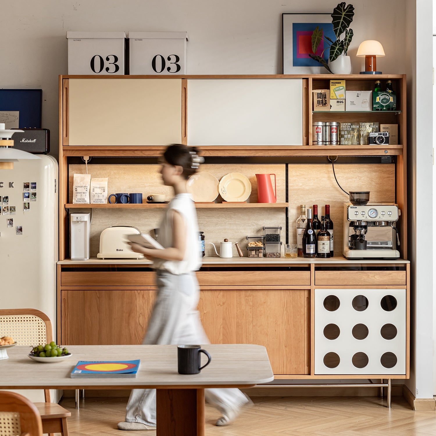 Multi-functional wooden kitchen cabinet with open shelves and appliance storage, ideal for dining areas, featured in Loft Home’s lead time-based furniture collection.