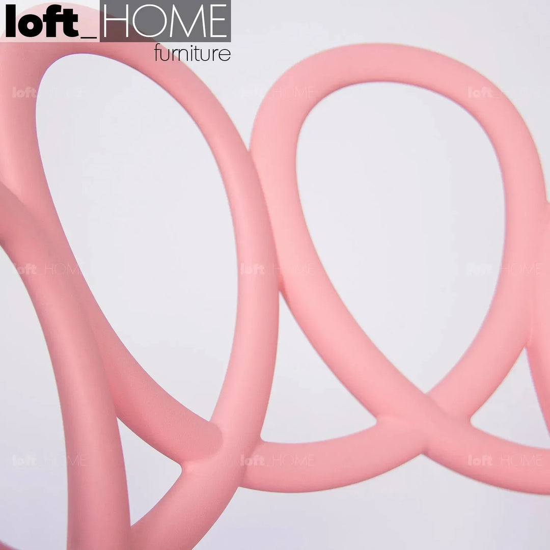 Contemporary plastic dining chair mila in details.