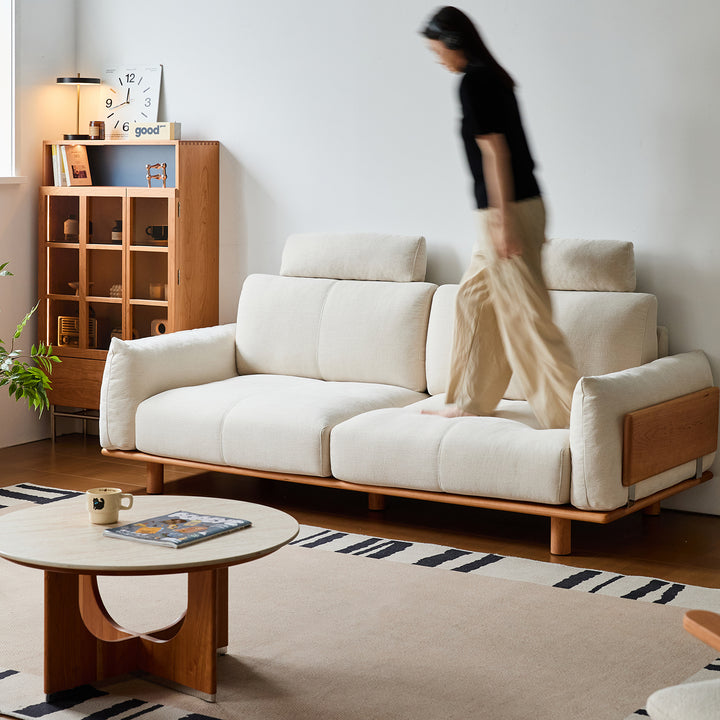 Scandinavian mixed weave fabric 3 seater sofa bessen in still life.