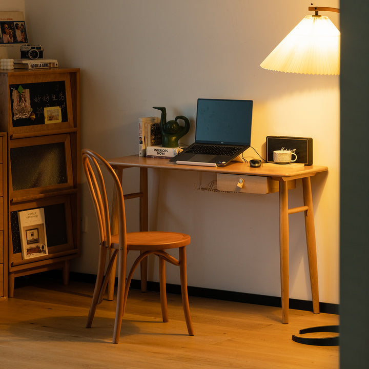Scandinavian cherry wood study table kashima in still life.