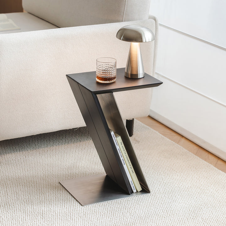Minimalist stainless steel side table zig in panoramic view.