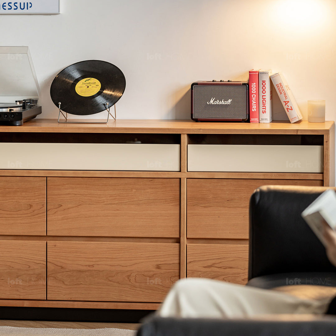 Scandinavian cherry wood chest of drawers timeless 9 in still life.