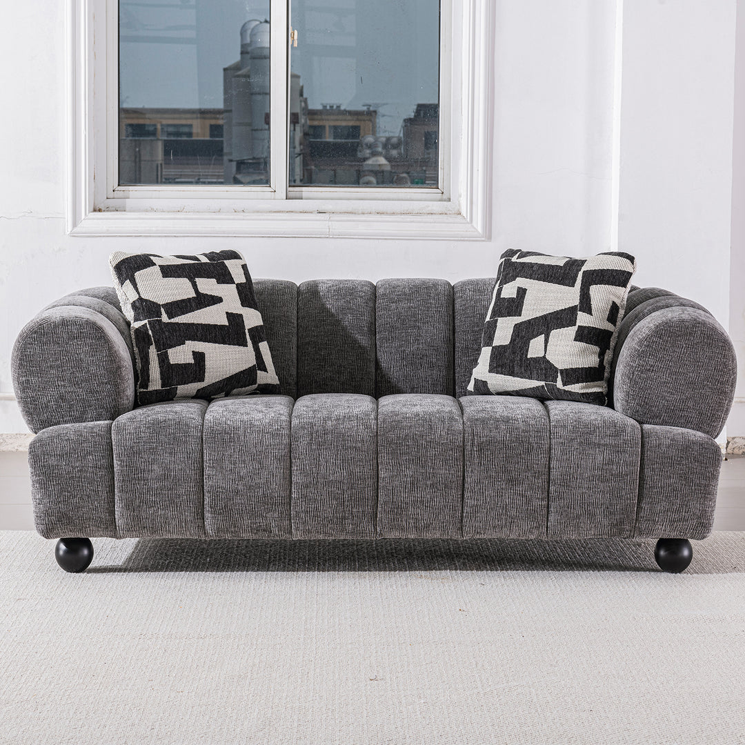 Modern velvet fabric 2 seater sofa raven in panoramic view.