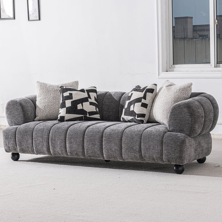 Modern velvet fabric 3 seater sofa raven in panoramic view.