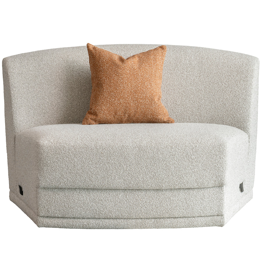 Modern boucle fabric modular armless 1 seater sofa curva in white background.