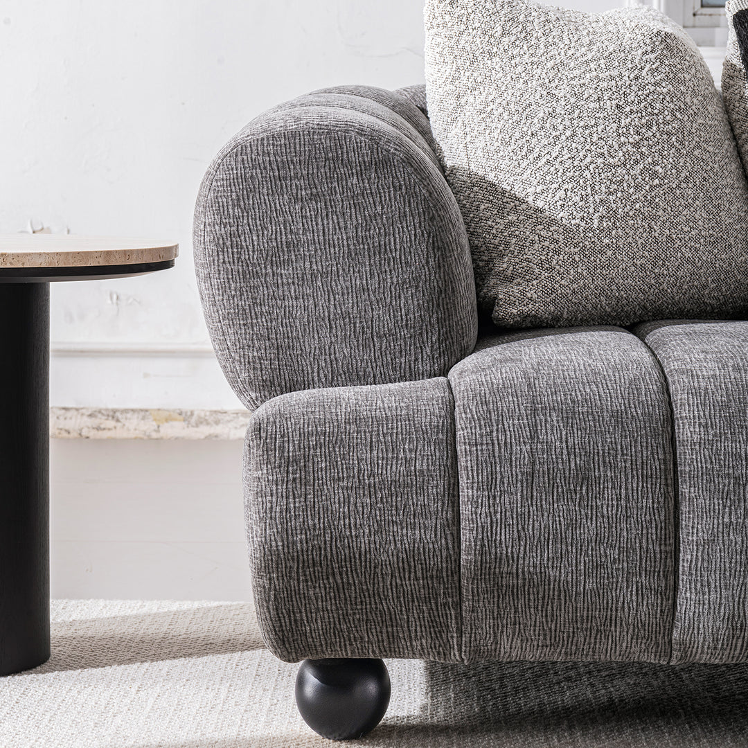 Modern velvet fabric sectional 4 seater sofa raven with context.