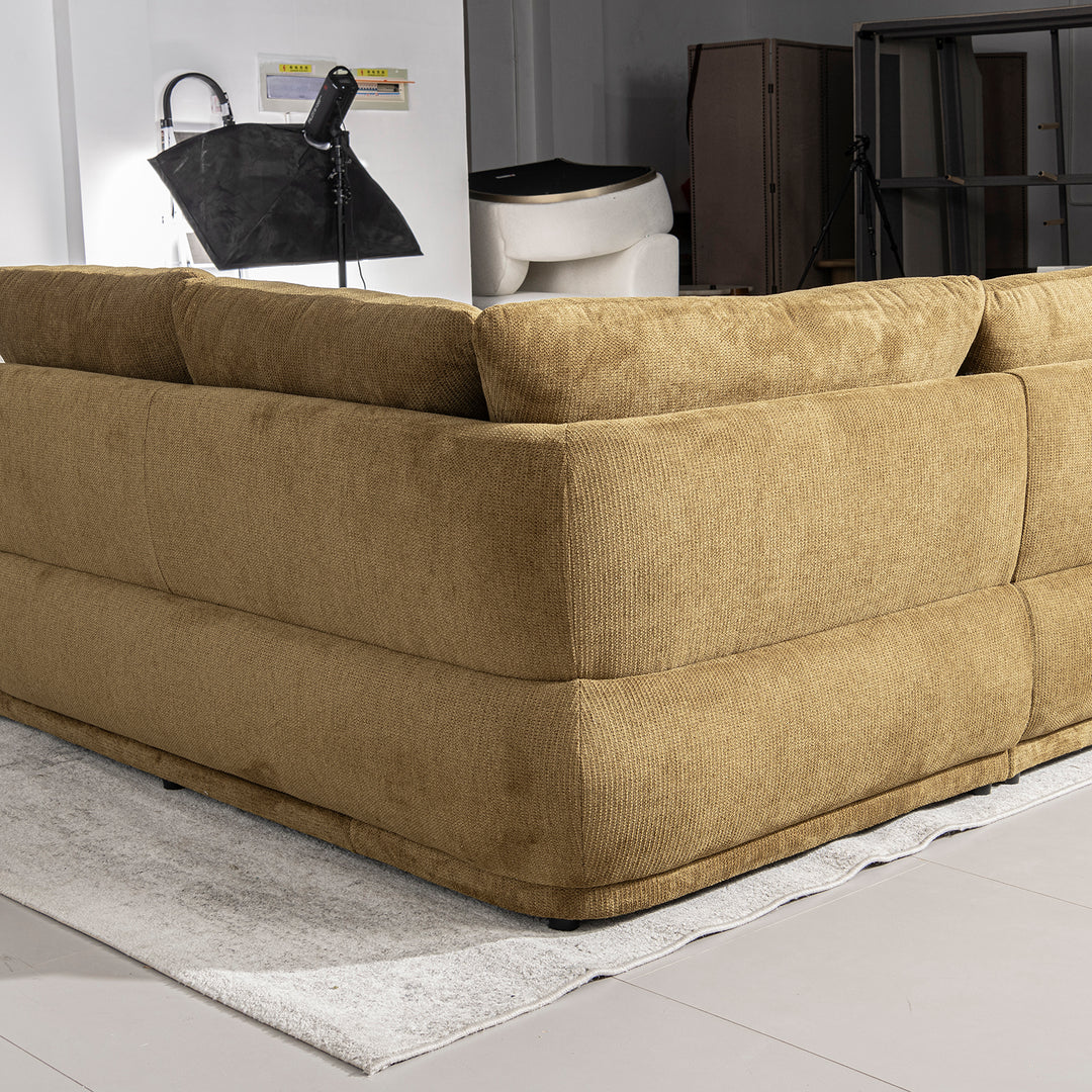 Cream cotton fabric modular chaise 2 seater sofa mossy in details.
