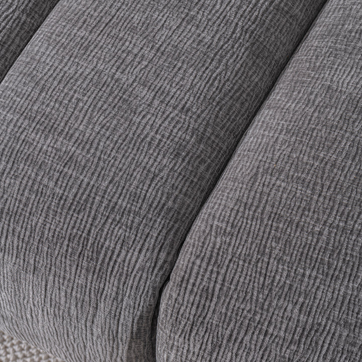 Modern velvet fabric 3 seater sofa raven in close up details.