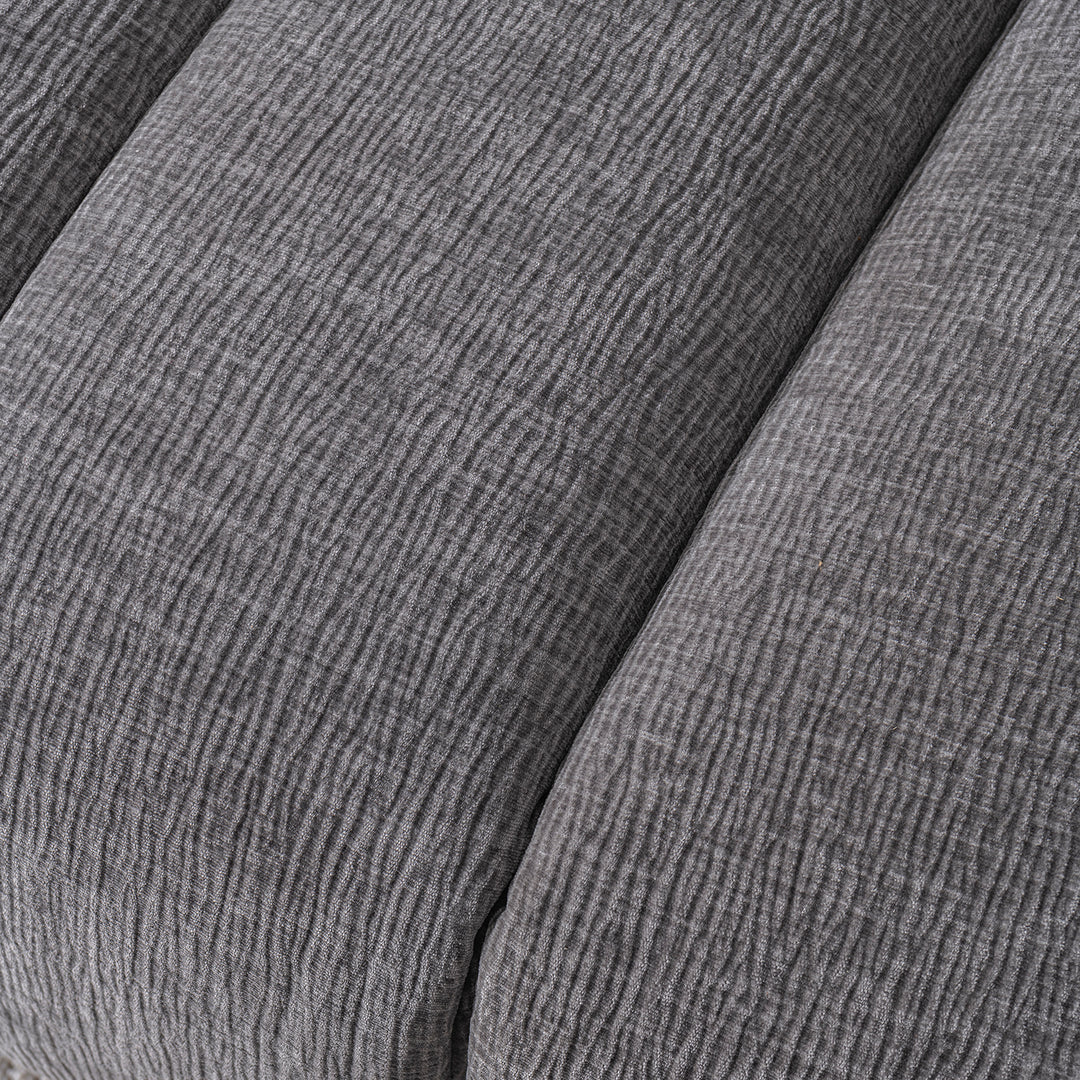 Modern velvet fabric sectional 4 seater sofa raven in close up details.