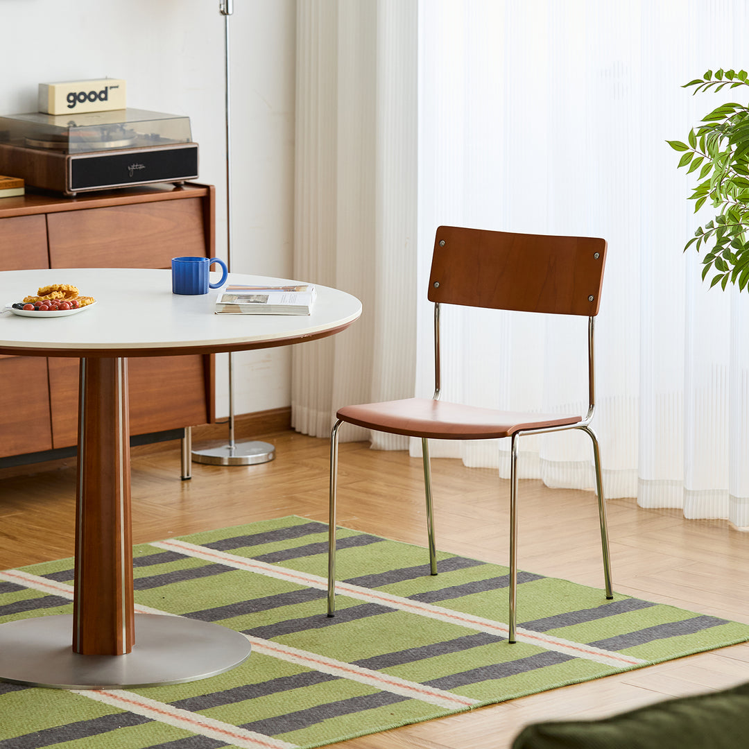 Scandinavian boxwood armless dining chair pinecone primary product view.