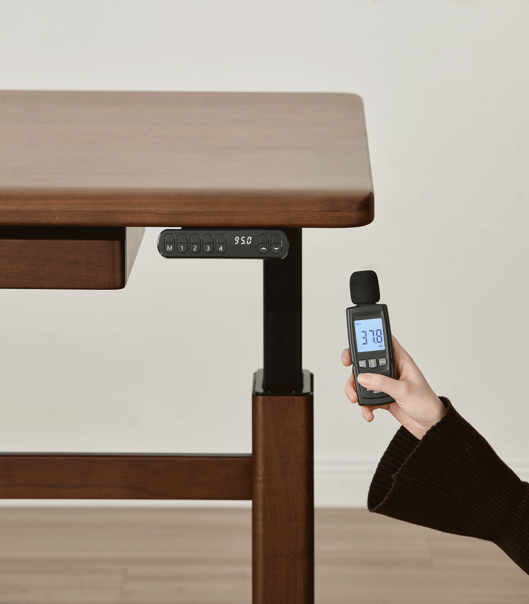 Japandi walnut wood electric height adjustable study table cloud lifting in real life style.