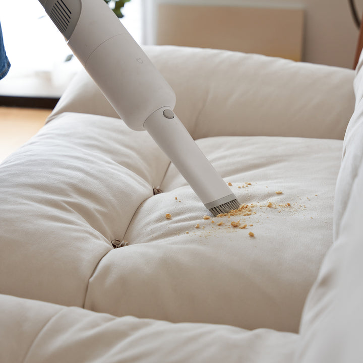 Scandinavian premium cat scratch resistant fabric sofa cover in close up details.