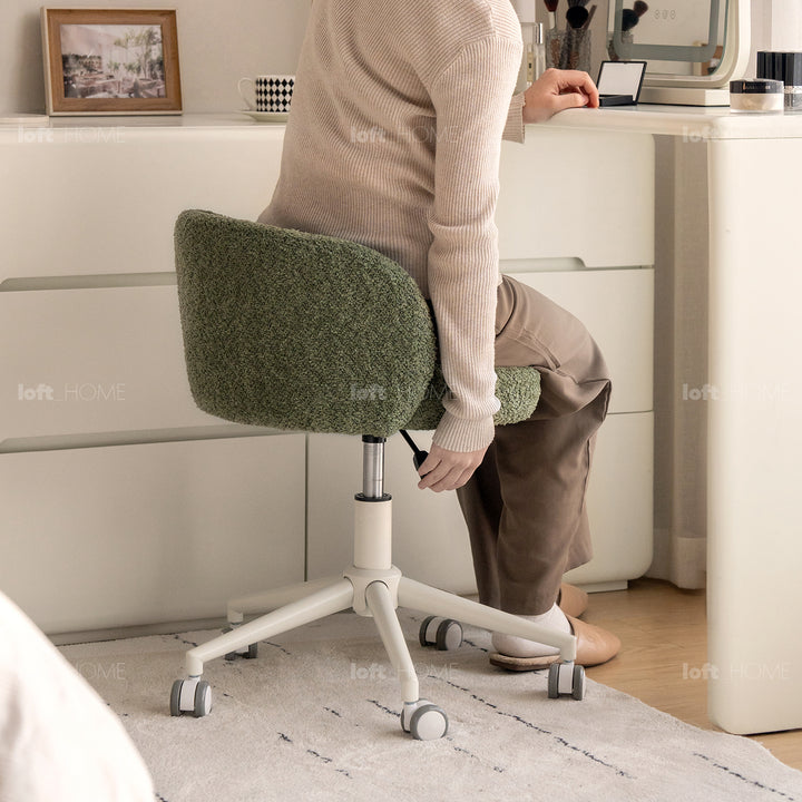 Cream boucle fabric office chair ins in still life.