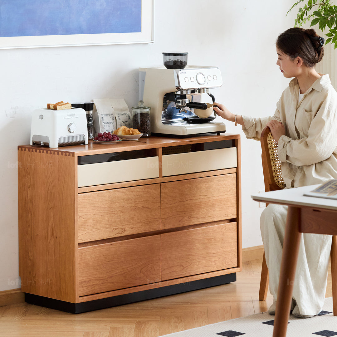 Scandinavian cherry wood chest of drawers timeless 6 in still life.