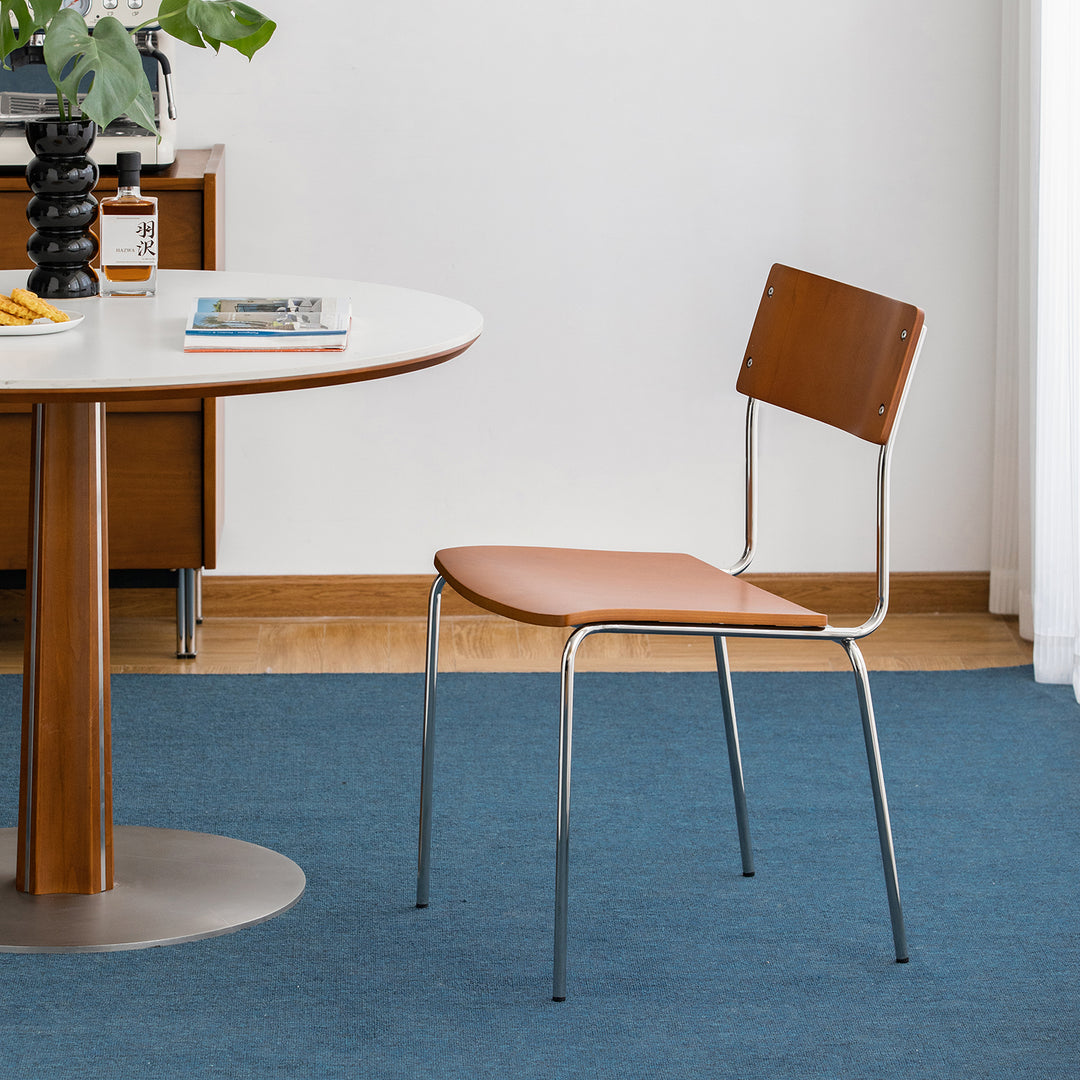 Scandinavian boxwood armless dining chair pinecone color swatches.