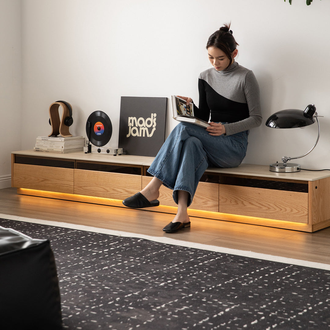Scandinavian oak wood tv console floating light with context.