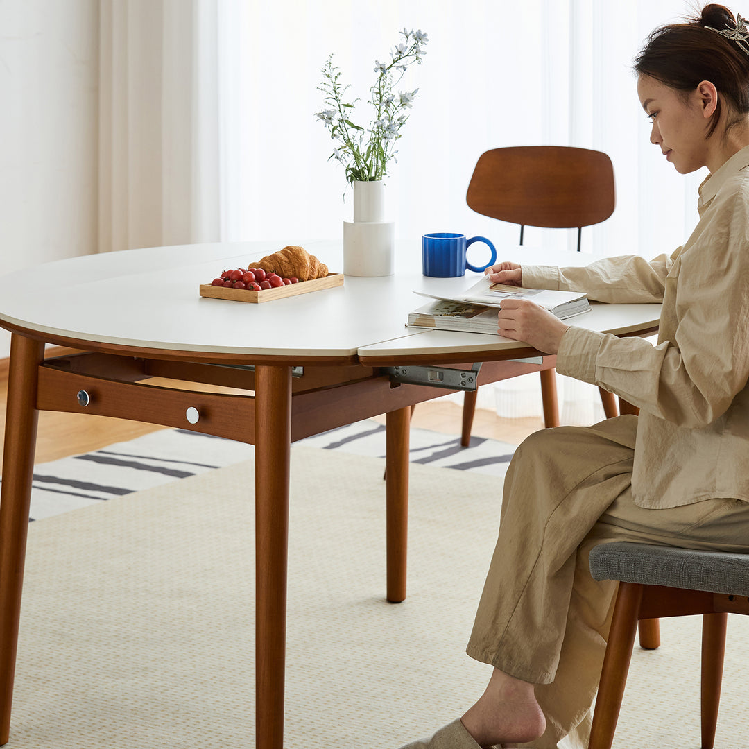Vintage sintered stone extendable dining table minima with context.