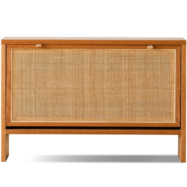 Scandinavian rattan shoe cabinet kangaroo in panoramic view.