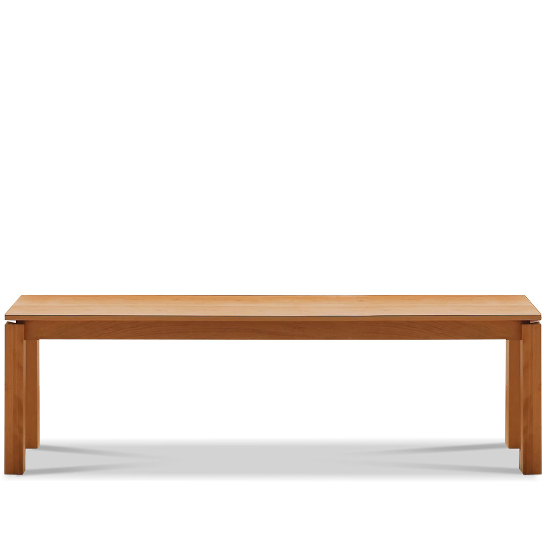 Minimalist cherry wood dining bench coastal in white background.