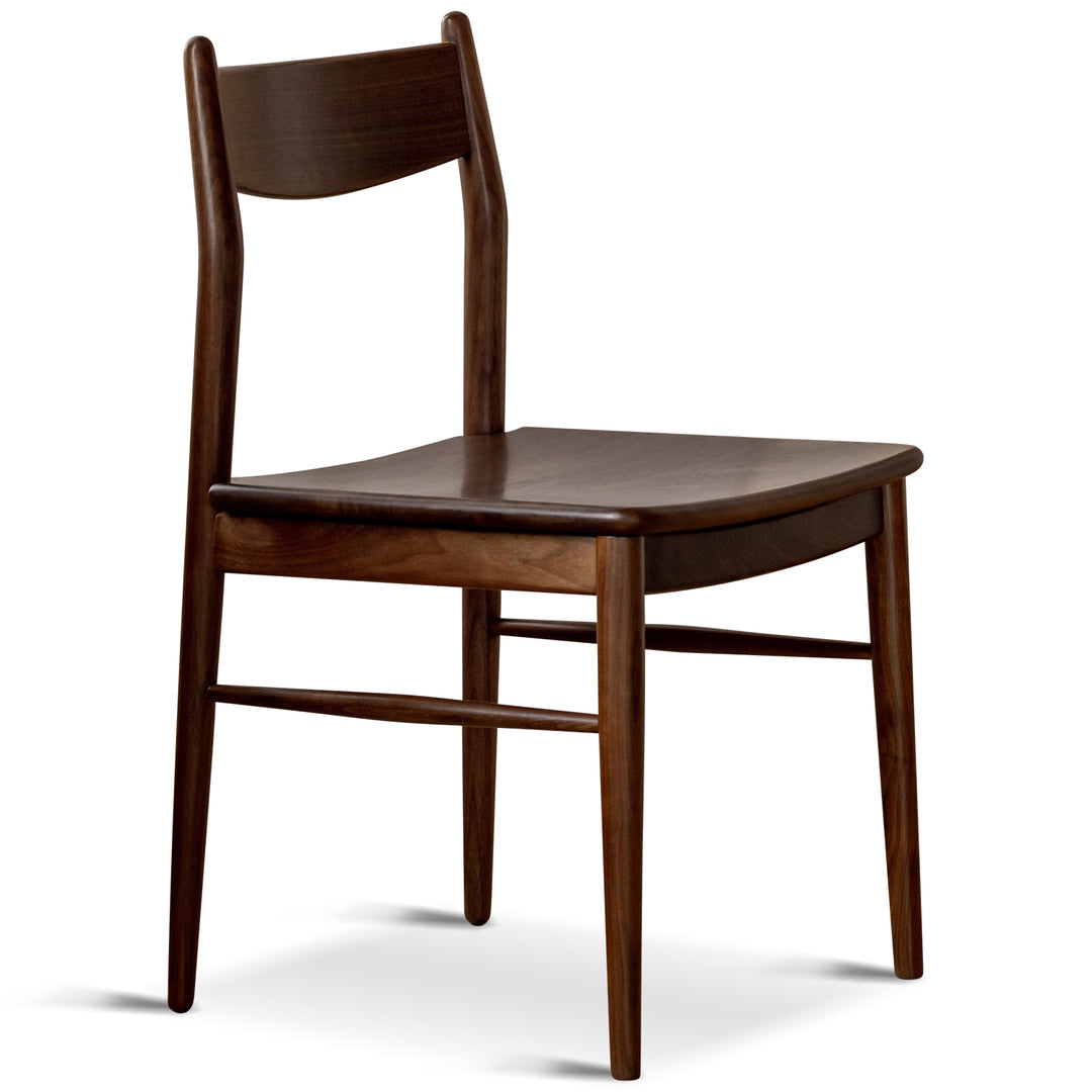 Vintage walnut wood dining chair chrono in white background.