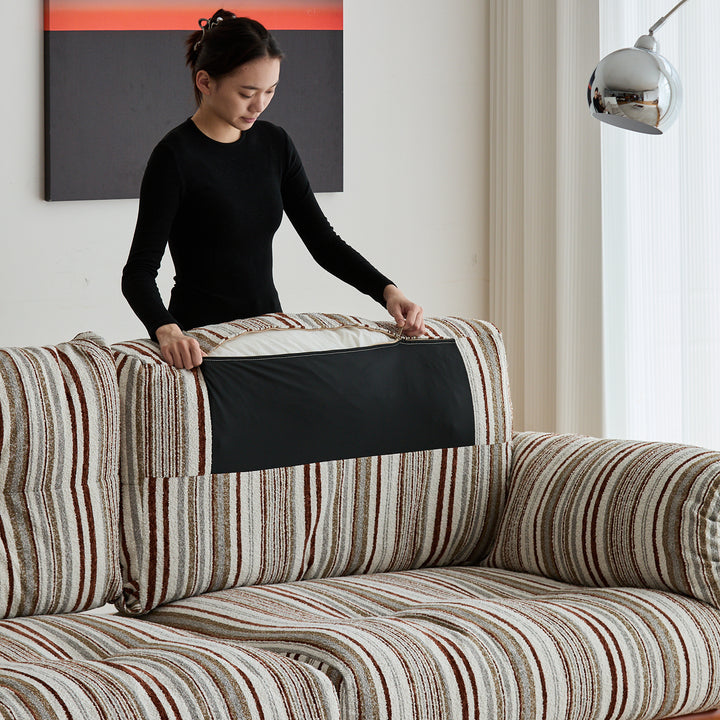 Scandinavian chenille velvet fabric boxwood 3 seater sofa open backed in panoramic view.