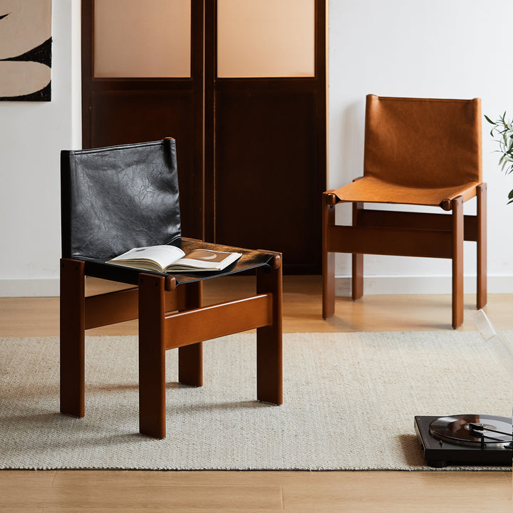 Vintage genuine leather dining chair tansu with context.
