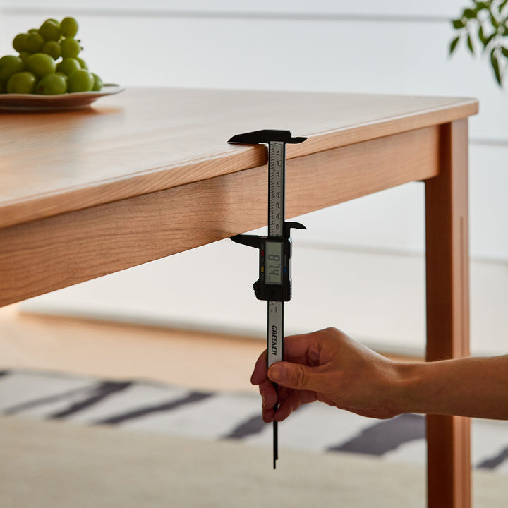 Scandinavian cherry wood dining table eclipse in details.