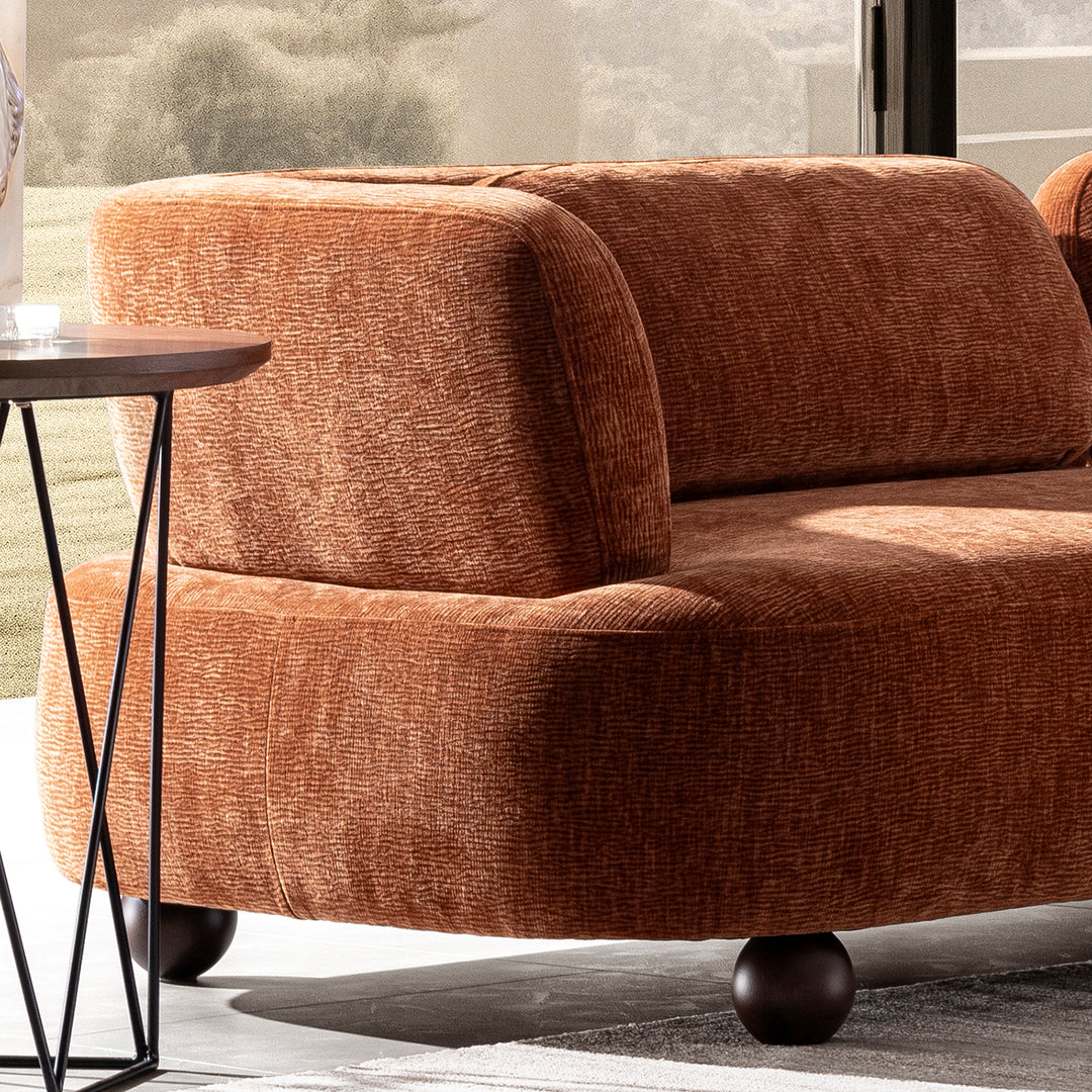 Cream velvet fabric modular corner 3 seater sofa bubba with context.