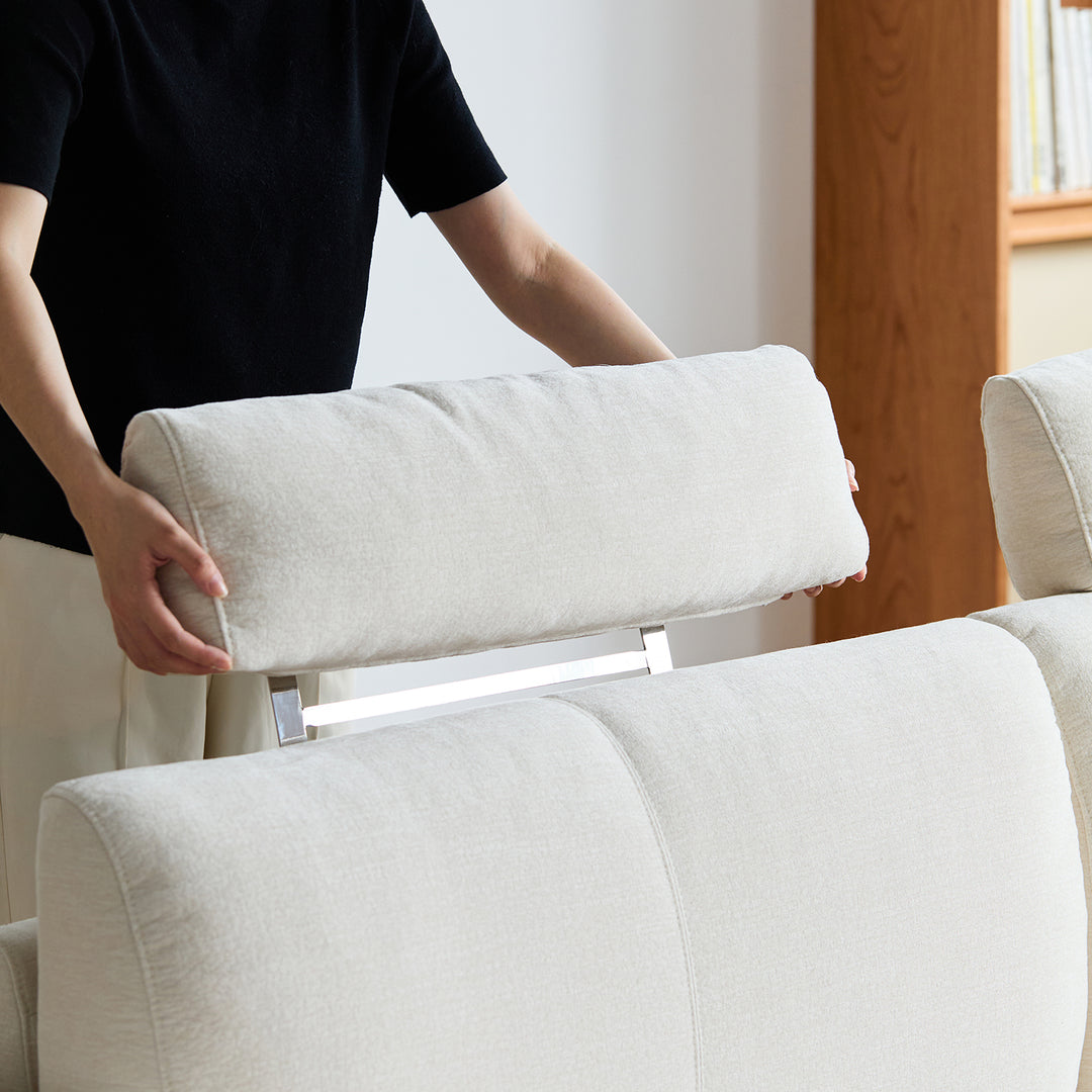 Scandinavian mixed weave fabric 4 seater sofa bessen in panoramic view.