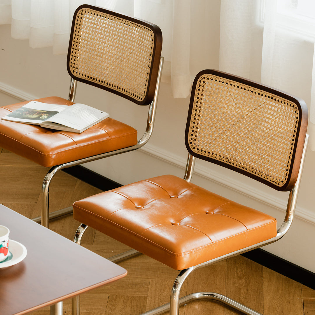 Vintage rattan pu leather dining chair hoh xil in close up details.