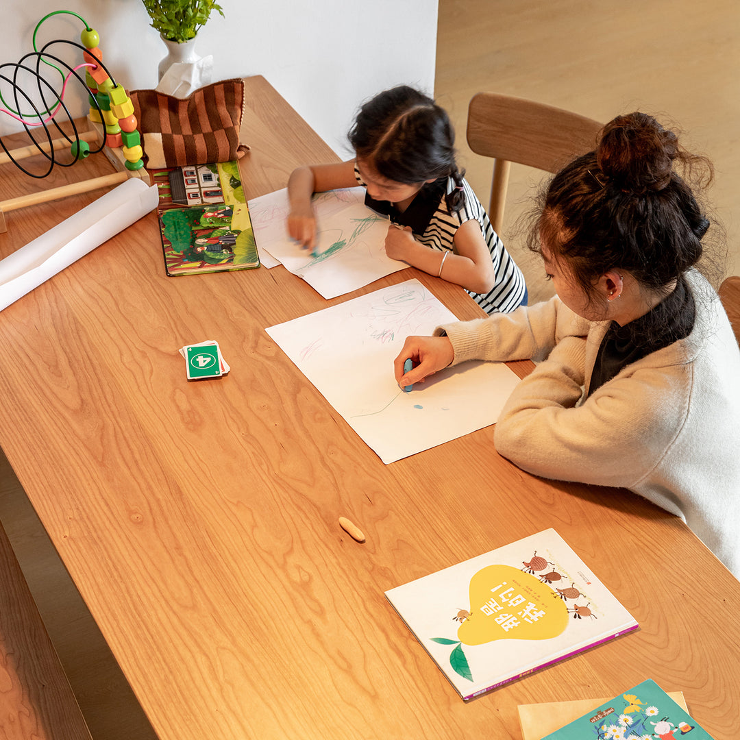 Scandinavian cherry wood dining table shoreline in details.