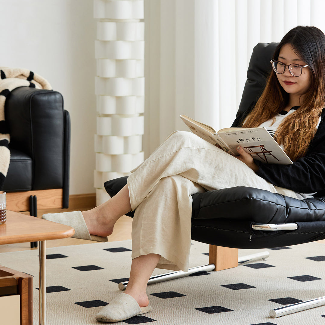 Scandinavian microfiber leather 1 seater sofa chair tessidi in close up details.