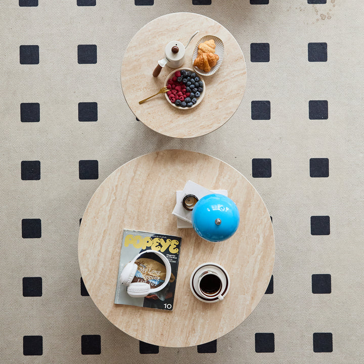 Scandinavian sintered stone coffee table set shells in close up details.