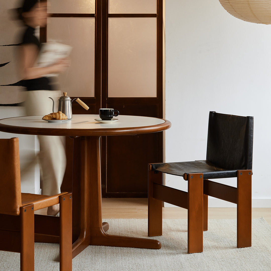 Vintage genuine leather dining chair tansu in close up details.