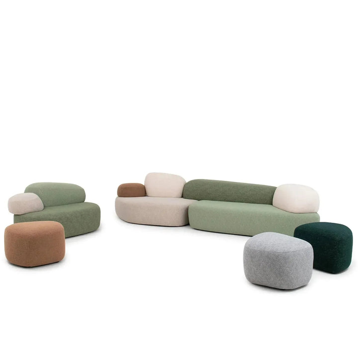 Contemporary fabric 7 seater sofa pebble with context.