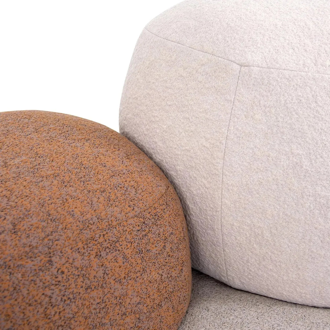 Contemporary fabric 4 seater sofa pebble in close up details.