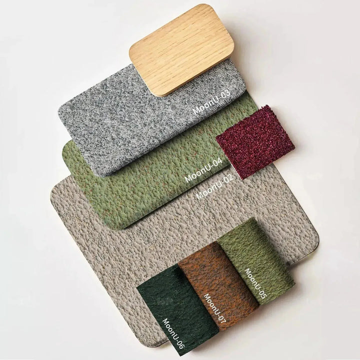 Contemporary fabric 4 seater sofa pebble material variants.