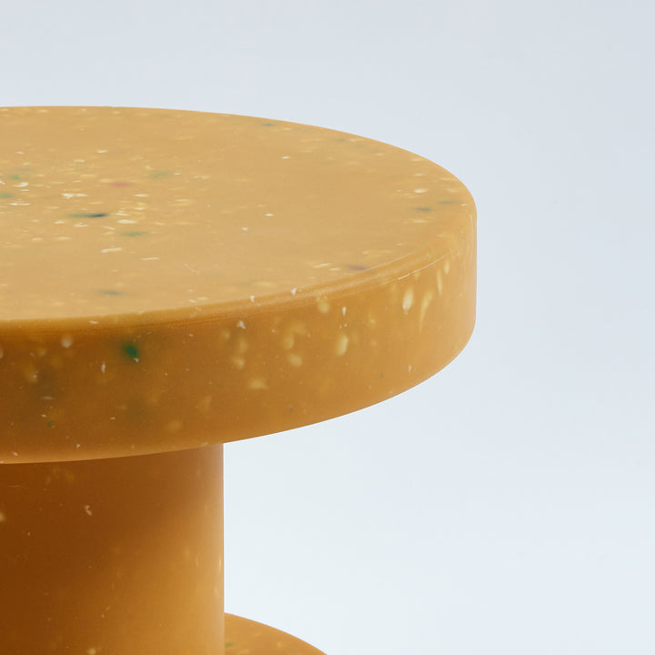 Contemporary plastic stool side table pixel with context.