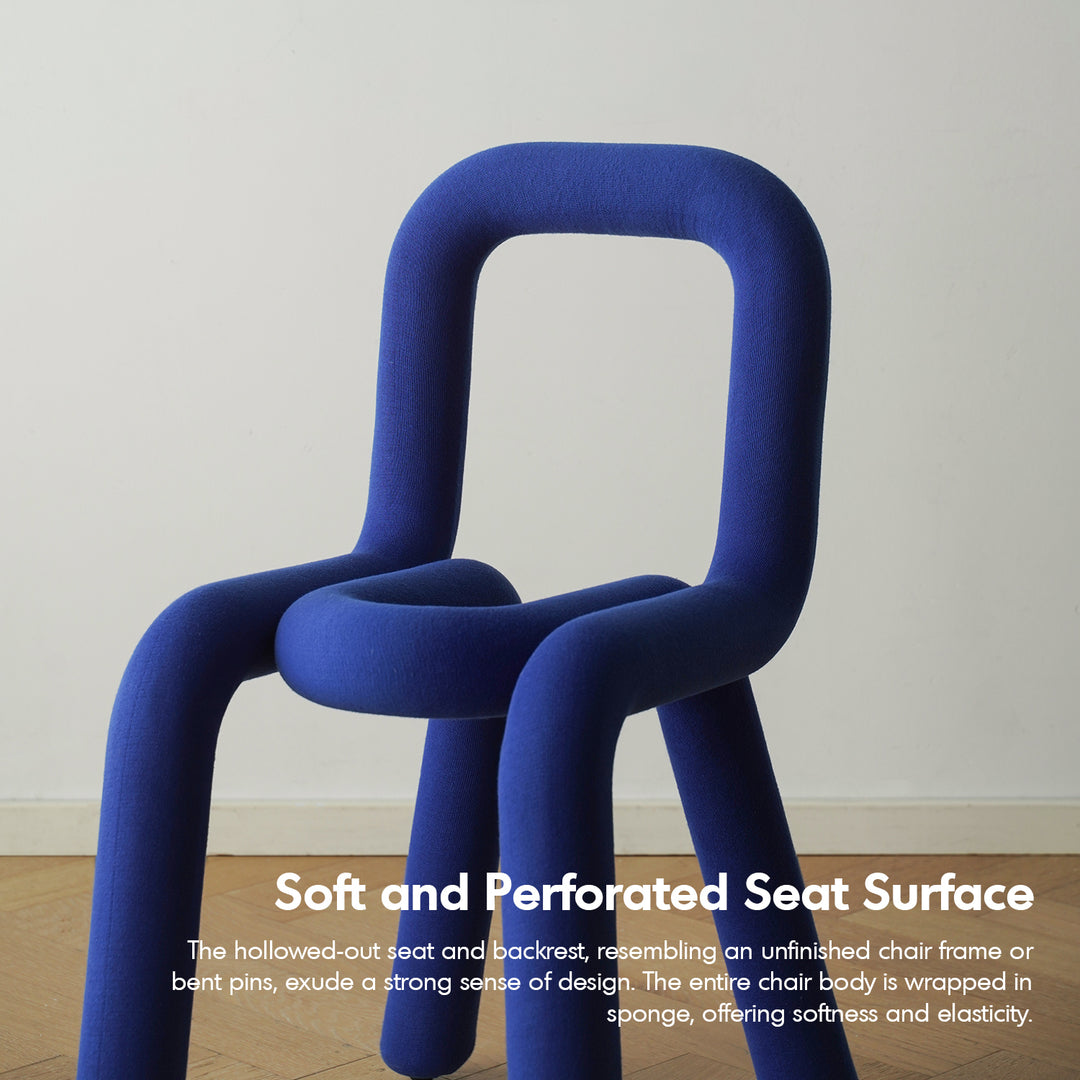 Contemporary velvet fabric dining chair bold material variants.