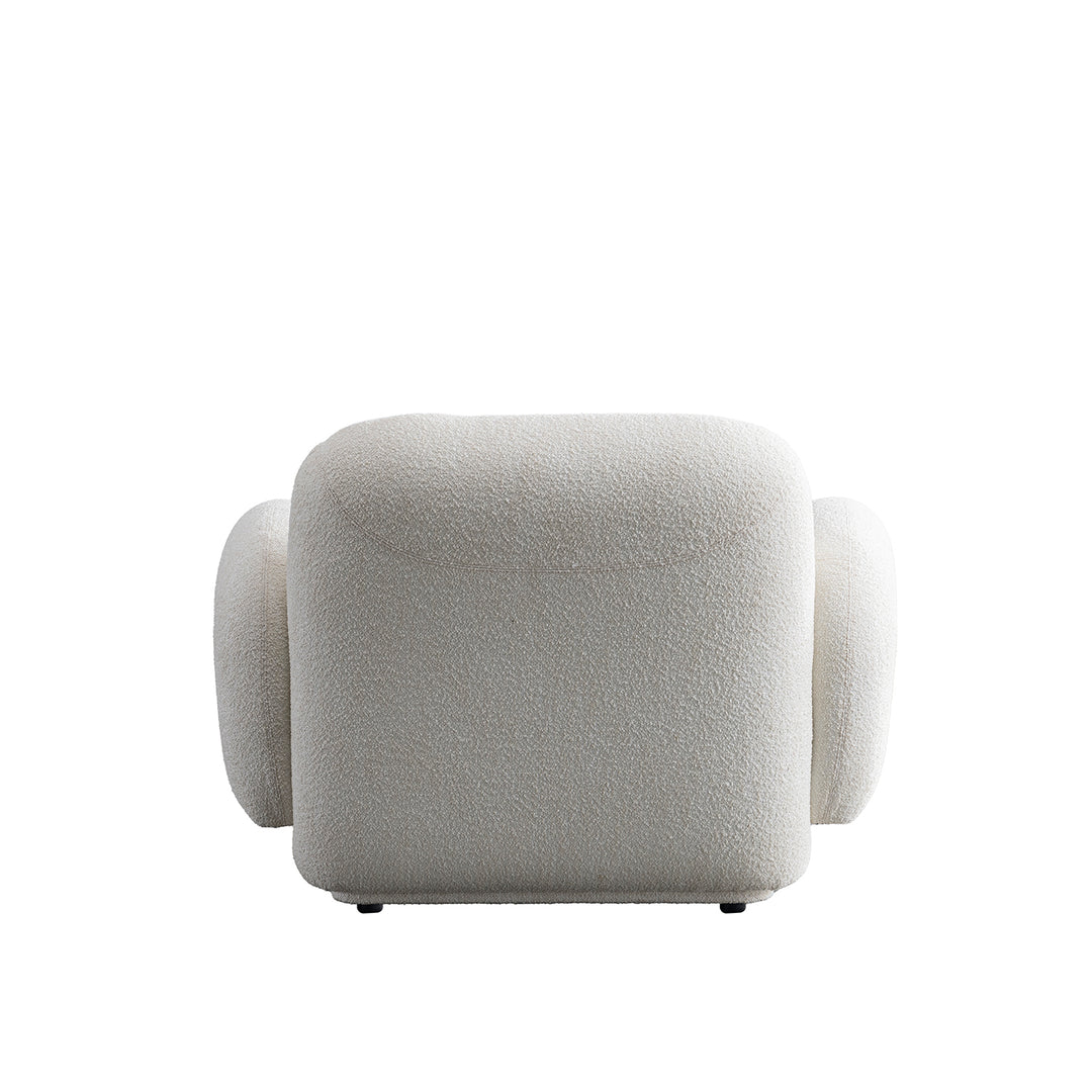 Cream boucle fabric 1 seater sofa pluum in real life style.