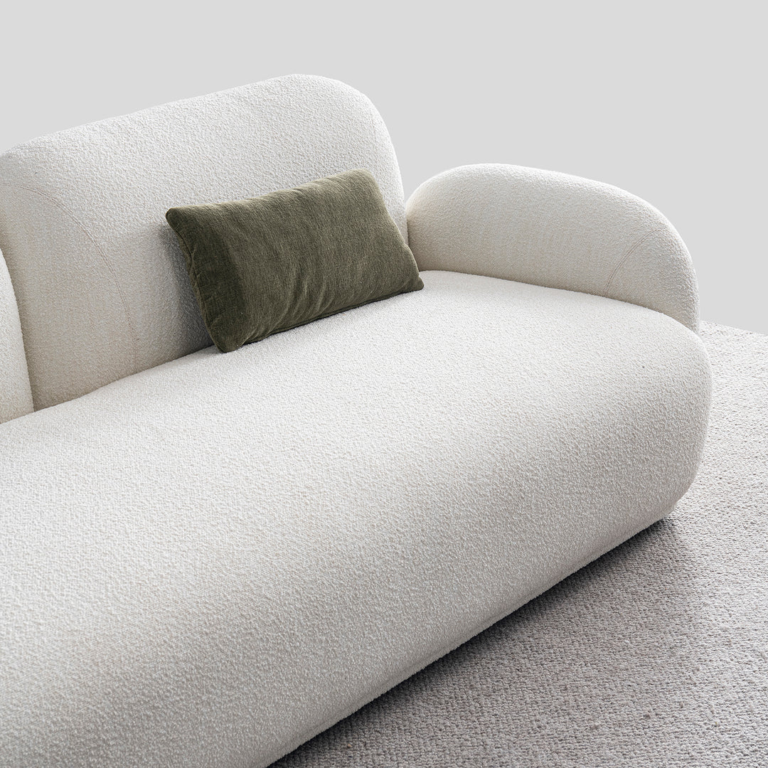 Cream boucle fabric 2 seater sofa pluum in real life style.