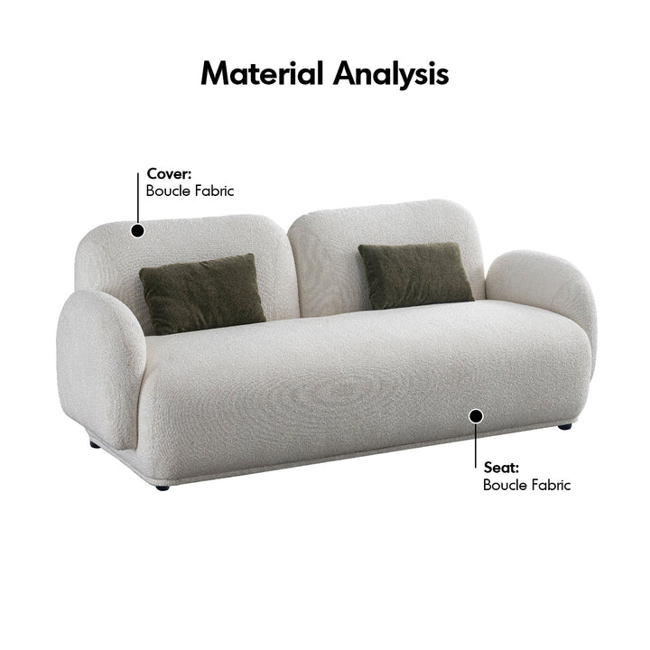 Cream boucle fabric 2 seater sofa pluum in details.