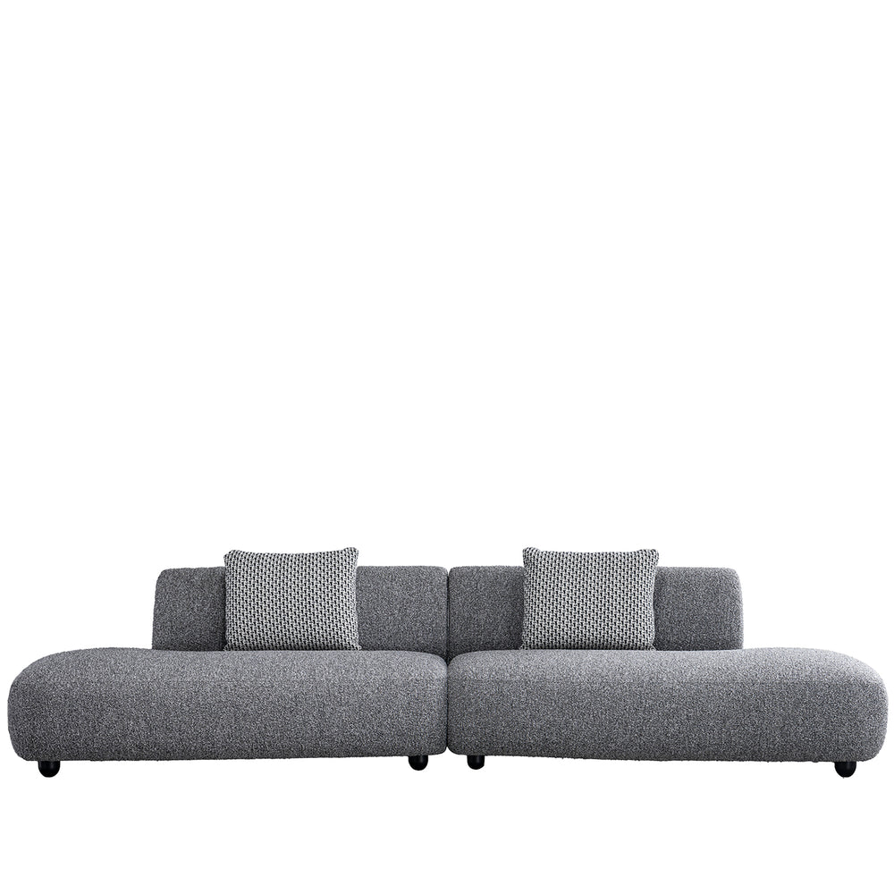Cream boucle fabric 5 seater sofa vuum in white background.