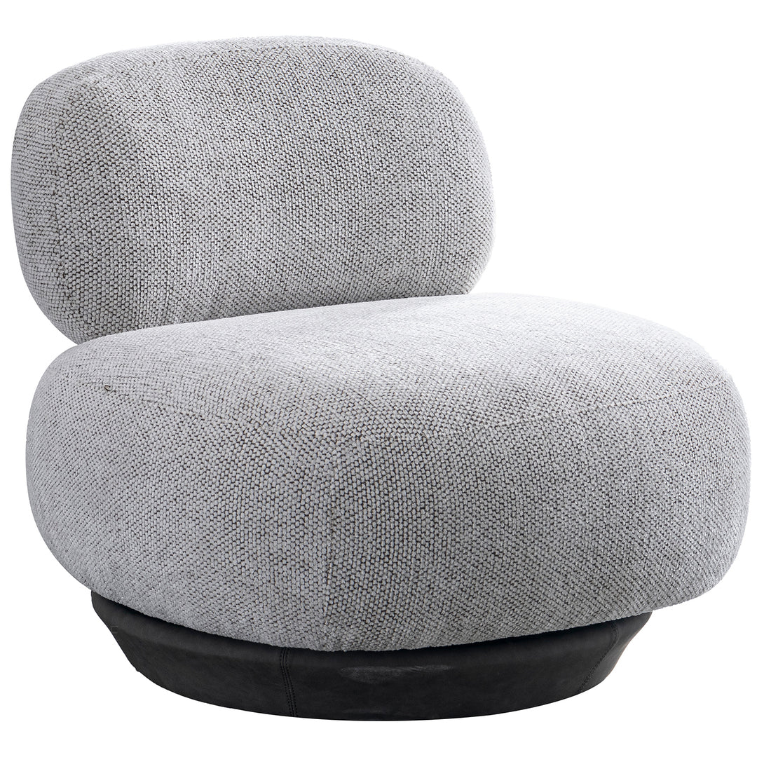 Cream mixed weave fabric revolving 1 seater sofa bixy in still life.