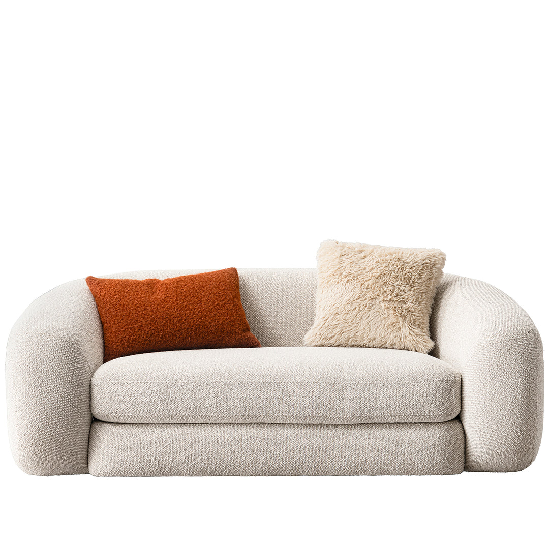 Cream boucle fabric 2 seater sofa curly in white background.