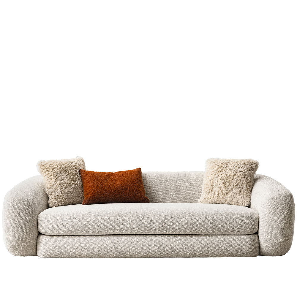 Cream boucle fabric 3 seater sofa curly in white background.
