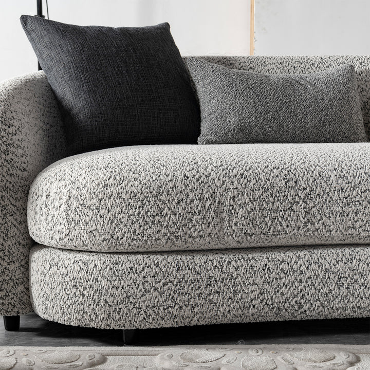 Cream boucle fabric 4 seater sofa nova with context.
