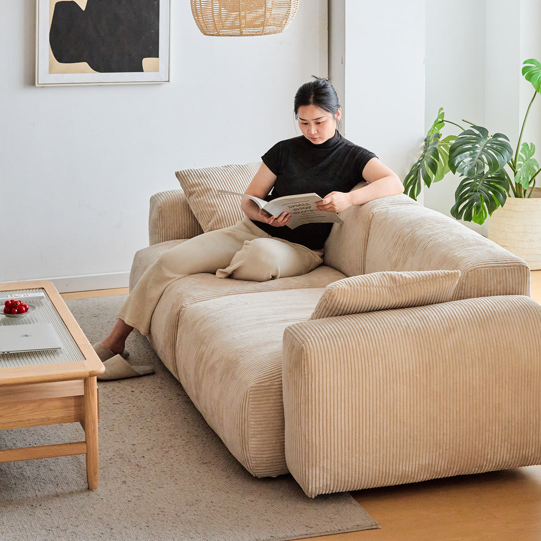 Cream corduroy velvet fabric 3 seater sofa square environmental situation.