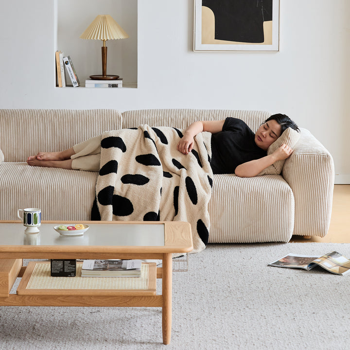 Cream corduroy velvet fabric 4 seater sofa square in real life style.