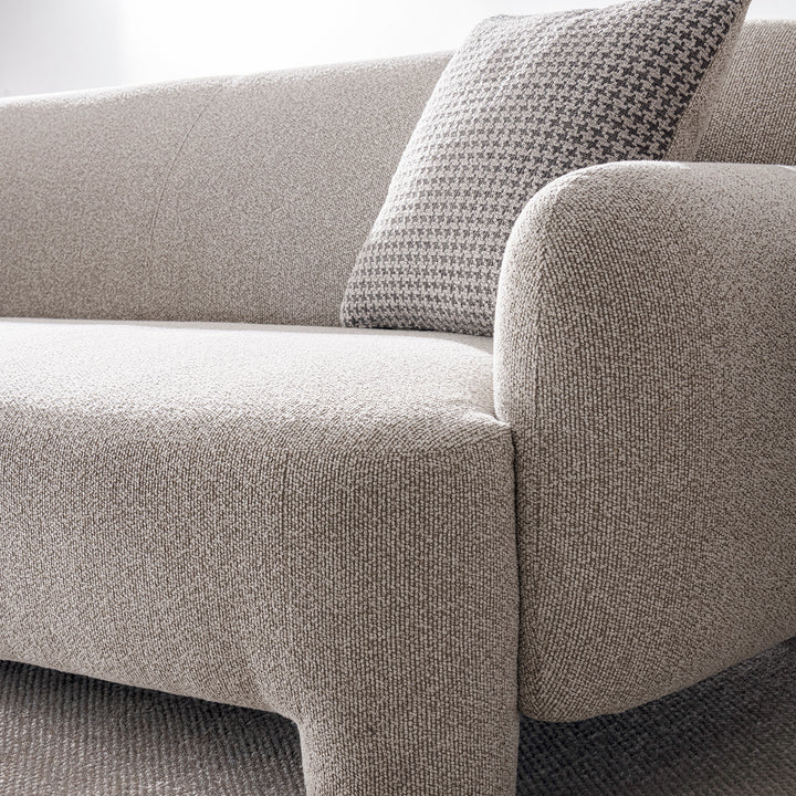 Cream mixed weave fabric 3 seater sofa syra in details.